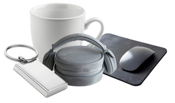 collection of promotional merchandise: white mug, grey travel case for headphones, keychain, and mouse pad with mouse.