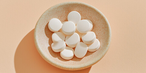 White Tablets in Speckled Ceramic Bowl
