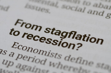 a newspaper headline reading From stagflation to recession? discussing critical shifts in economic...