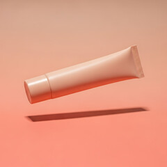 Peach Cosmetic Tube Floating on Vibrant Coral Background