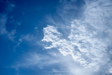 Obraz premium Blue Sky with Soft White Clouds and Copy Space