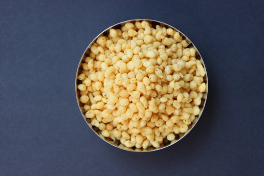 Bundi or boondi is a versatile Indian snack made from deep-fried chickpea flour droplets