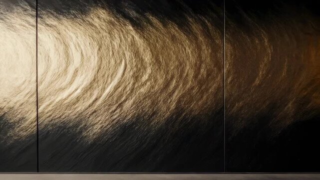 Textured, metallic wall panels with dramatic lighting creating a dynamic, abstract pattern