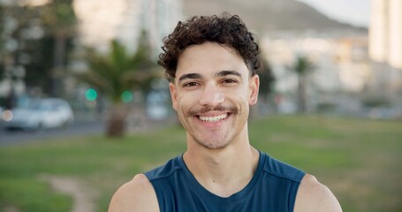 Fototapeta premium Portrait, man and smile for fitness outdoor with pride, exercise and cardio training. Happy, male person or confident runner for endurance workout, sports challenge and fresh air for wellness at park