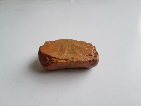 natural rock specimens, in the form of sedimentary rock types such as argillite or claystone.