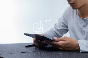 Man Holding Tablet with Approval Icon for Digital Content Review