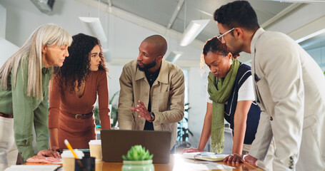 Advertising, discussion or people with laptop in office, planning meeting or promotion campaign development. Speaking, branding project or marketing team together for brainstorming, launch idea or pc © WesJVR/peopleimages.com
