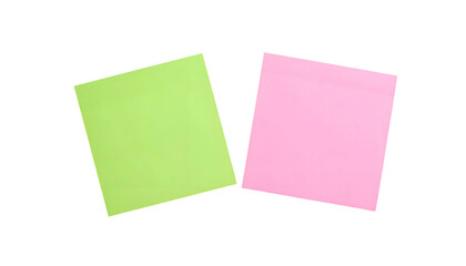 Two angled, colorful sticky notes, a green and pink, on a stark black background