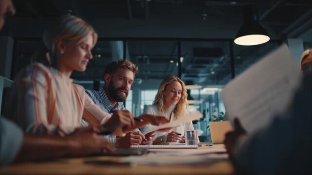 Modern Business Teamwork in a Collaborative Office Environment with Professionals Engaged in a Meeting