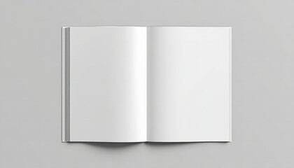 A blank white book lying open on a plain gray background with empty pages