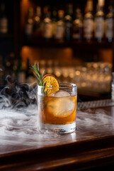 Naklejka premium Cocktail with Ice Vapor on Bar Counter