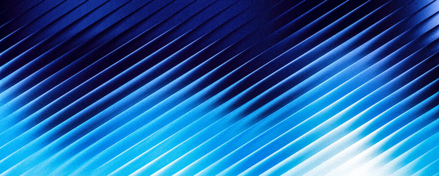 Grainy abstract background texture of blue corrugated surface with diagonal lines and gradient from dark to light blue, macro detail of ribbed material structure