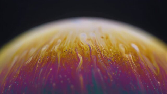 Vibrant abstract macro surface with flowing rainbow colors, suggesting creativity, energy, and modern design aesthetics for artistic, branding, and motion background use.