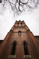 Red brick church shot from angle in Europe