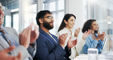Obraz premium Excited, business people and meeting with applause for presentation, good job or well done in office. Happy, group or employees clapping with smile for team promotion or congratulations in workplace
