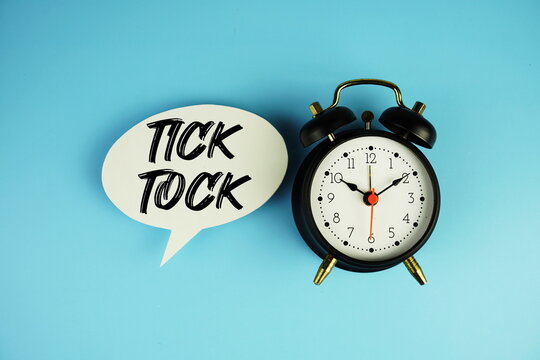 Tick Tock text on speech bubble with alarm clock on blue background
