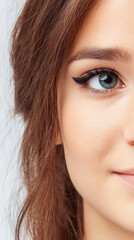 Obraz premium Close up of a model's eye with perfectly applied makeup for beauty and fashion