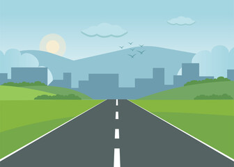 Open Road Leading Toward a Modern City with Green Hills and Clear Blue Sky