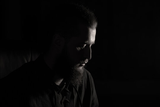 dramatic black & white man portrait bearded face calm emotion