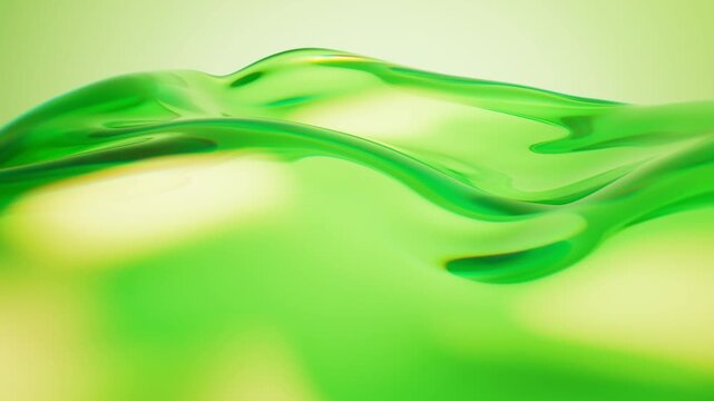 Abstract green glass waves moving slowly in cinematic liquid motion with soft lighting and elegant reflections