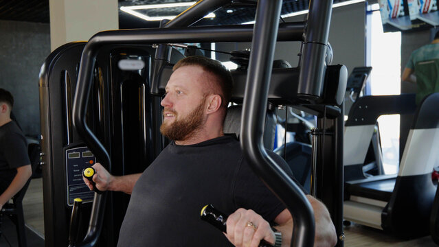 Athlete working out on back extension machine