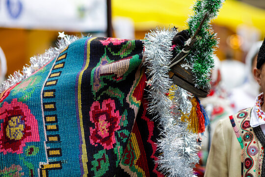 Details with the ancient Romanian tradition of Capra (The Goat) mainly performed between Christmas and New Year&rsquo;s Eve, featuring a costumed dancer wearing a decorated goat mask and fur