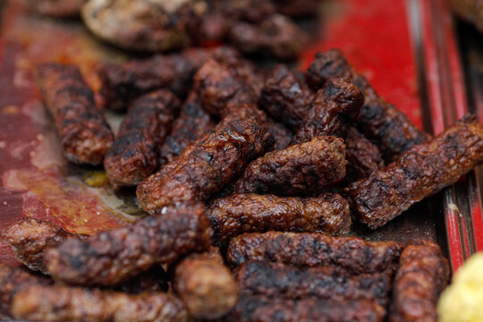 Details with mititei (mici), grilled minced meat in a farmers market
