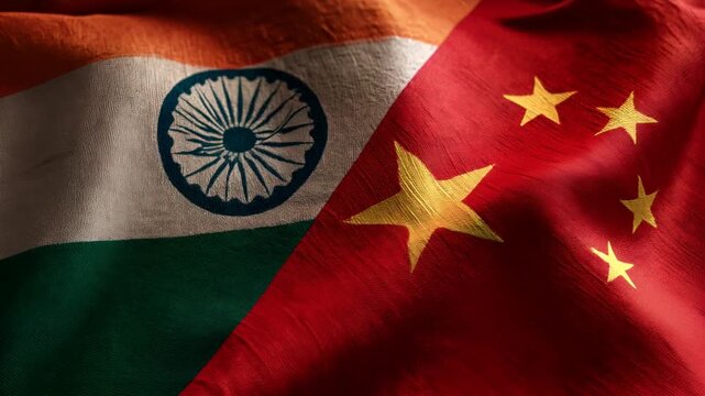 indian and chinese flag waving together. relations between india and china. agreement trade deal partnership brics friendship