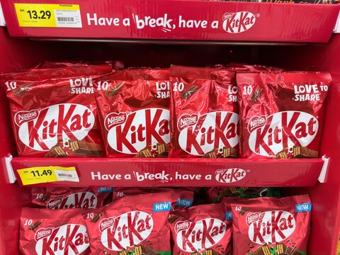 Rawang, Selangor, Malaysia - &lrm;January 28, 2026 - KitKat chocolate bars displayed on supermarket shelves, featuring red packaging and promotional pricing for everyday snacks.