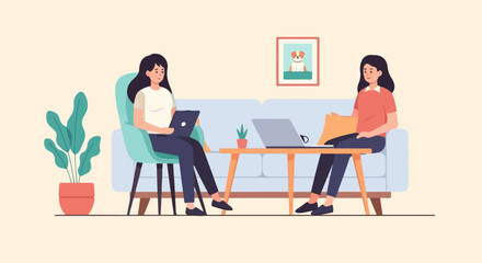 Fototapeta premium Two women work on laptops in a cozy room