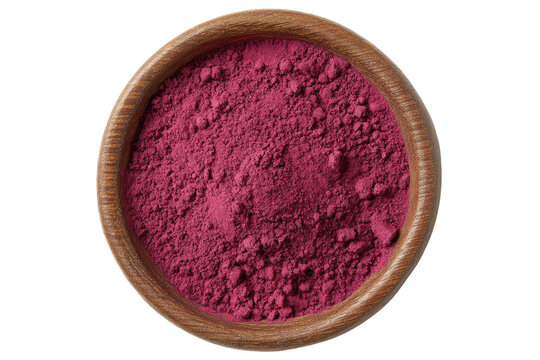 Deep crimson powder in a round wooden bowl