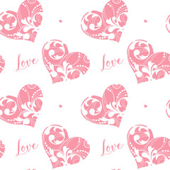 Fototapeta premium Seamless romantic pattern with ornamental hearts and handwritten love lettering in soft pink tones. Elegant repeating background for Valentines Day designs, wedding stationery, gift wrapping, textiles