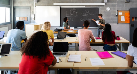 Students learning electronics in university stem classroom lecture
