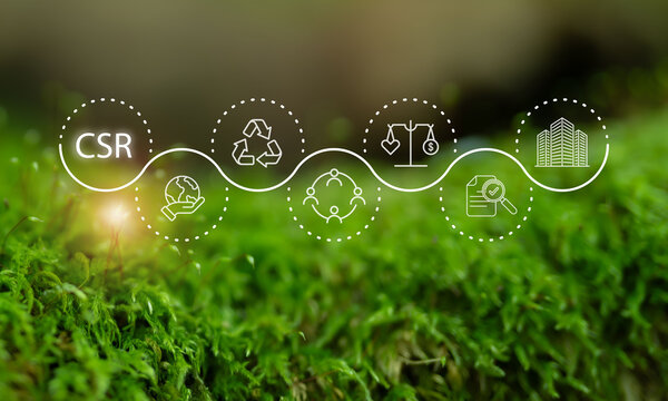 CSR (Corporate Social Responsibility) corporate sustainability concept. CSR icons flow across a green moss background. Companies integrate social and environmental concerns in business operations.