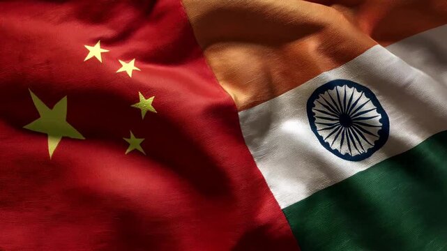 chinese and indian flag waving together. relations between china and india. agreement trade deal partnership brics friendship