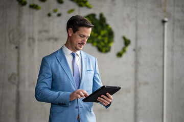 Businessman using tablet in modern office with australia map © Zoran Jesic