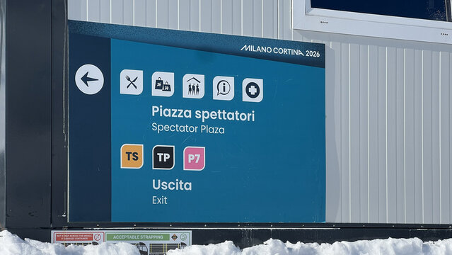 Livigno, Italy - February 1, 2026: Directional signage for Spectator Plaza at the Milano Cortina 2026 Winter Olympic Games venue in Livigno