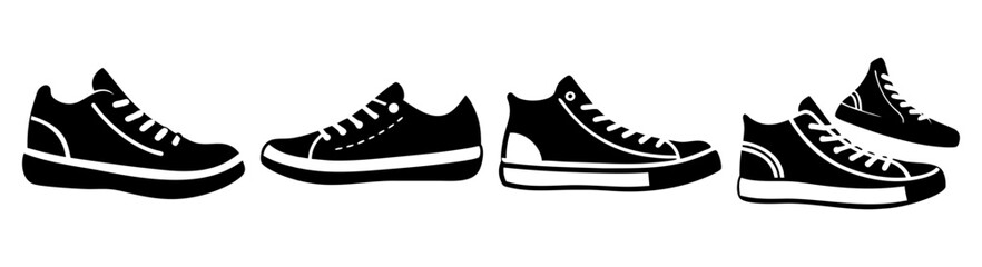 Set of four black and white sneakers isolated on white background minimalist flat lay footwear collection