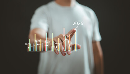 Person interacting with futuristic business growth chart from 2021 to 2026