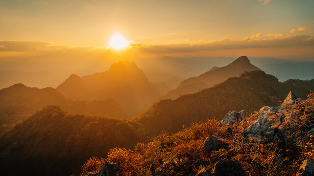 A sunset over the mountains; the beauty of the light against the rocky mountains of Doi Luang Chiang Dao.