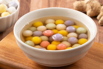 Colorful sweet glutinous rice balls tangyuan in sweet ginger syrup soup