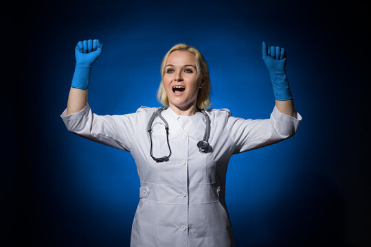 woman doctor celebrating victory. win concept
