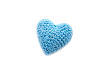 Knitted blue heart isolated on a white background