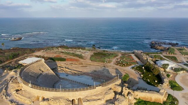 Aerial view of the Roman amphitheater of Caesarea and its remains on the Mediterranean coastline