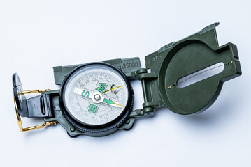Military style compass isolated on white background.