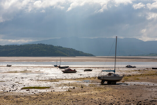 Low tide on the Afon Glaslyn estuary at Borth-y-Gest, Porthmadog, Gwynedd, Wales, with the Afon Dwyryd estuary beyond