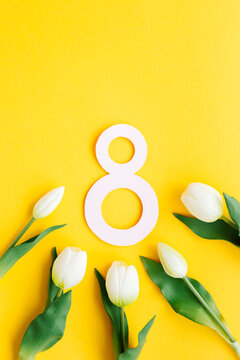 International Women's Day card with spring tulip flowers. A greeting card for March 8th.