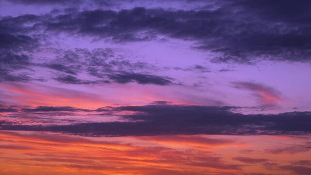 Orange Blue Lilac Morning Sky Sun Light Clouds Airplane Window View, Aerial View, Time Lapse. Amazing Bright Multi Colored Sunrise Cloudy Skyscraper in Sun Rays, Dawn Firmament Atmosphere Heaven 4K.