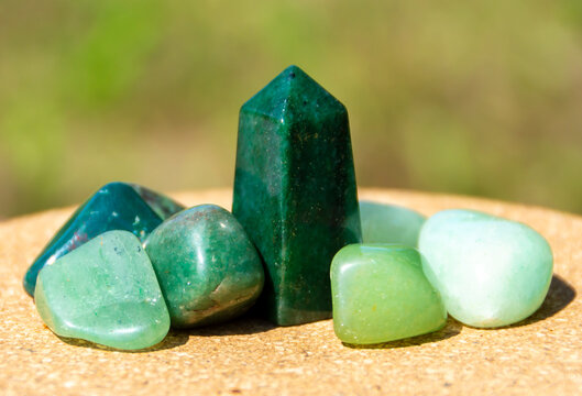 A close-up of a natural mineral against a natural background. Mineralogy. Creating handmade items from natural stone.