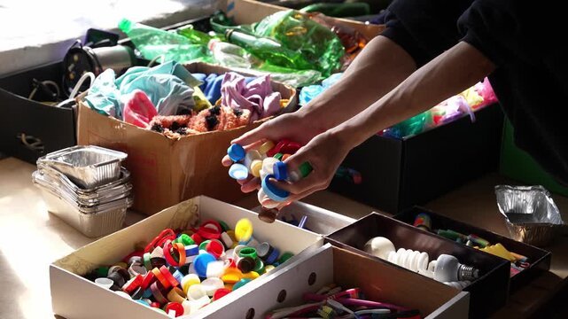 Collecting plastic bottle caps HDPE or PP. Recycling Center. Recycling Center